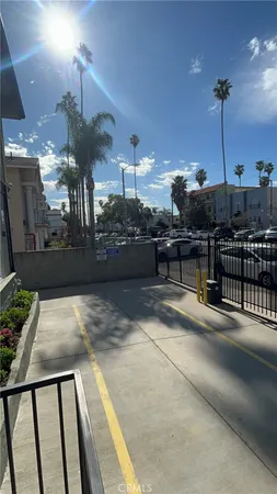 a view of a hall with furniture