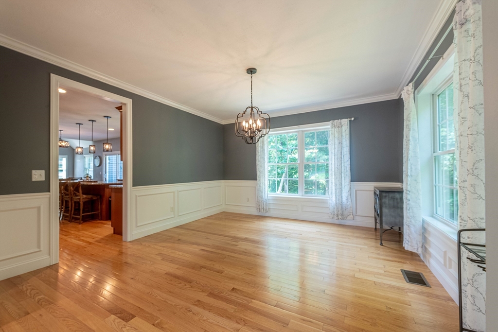 22 Jacob Road Windham, NH 03087 - Photo 15 of 42 a view of livingroom with window hardwood floor and cabinet