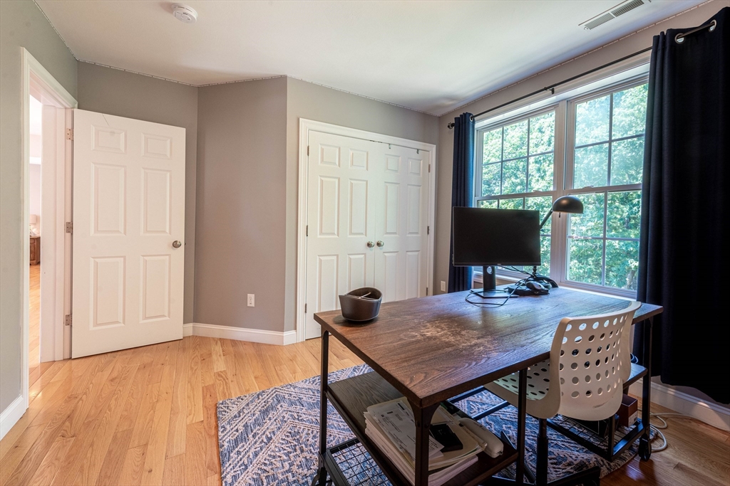 22 Jacob Road Windham, NH 03087 - Photo 27 of 42 a view of a workspace with furniture and a window