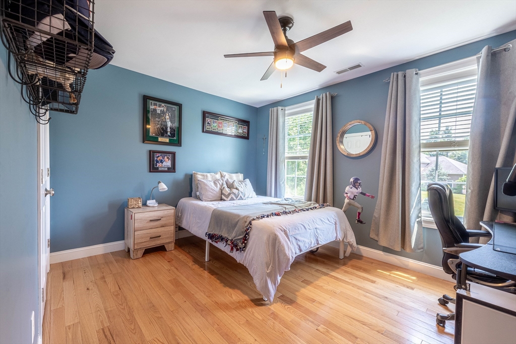 22 Jacob Road Windham, NH 03087 - Photo 29 of 42 a bedroom with a bed furniture and a window