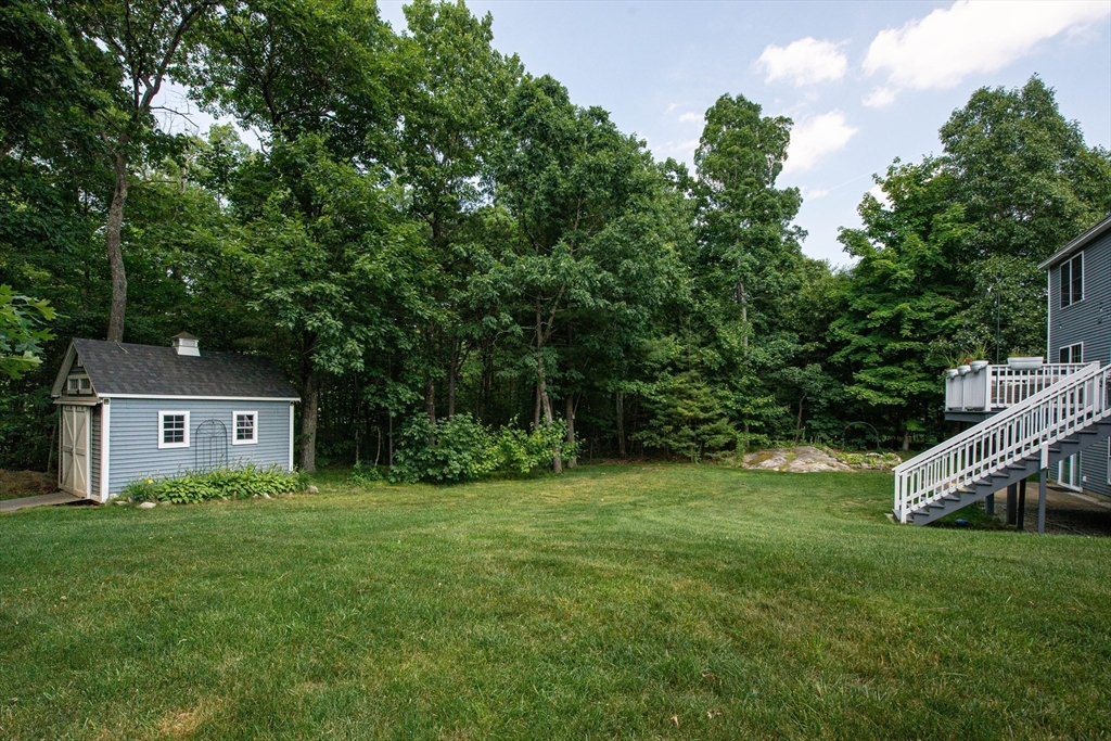 22 Jacob Road Windham, NH 03087 - Photo 39 of 42 a front view of a house with a yard