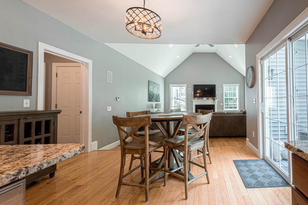 22 Jacob Road Windham, NH 03087 - Photo 9 of 42 a view of a livingroom with furniture and a flat screen tv