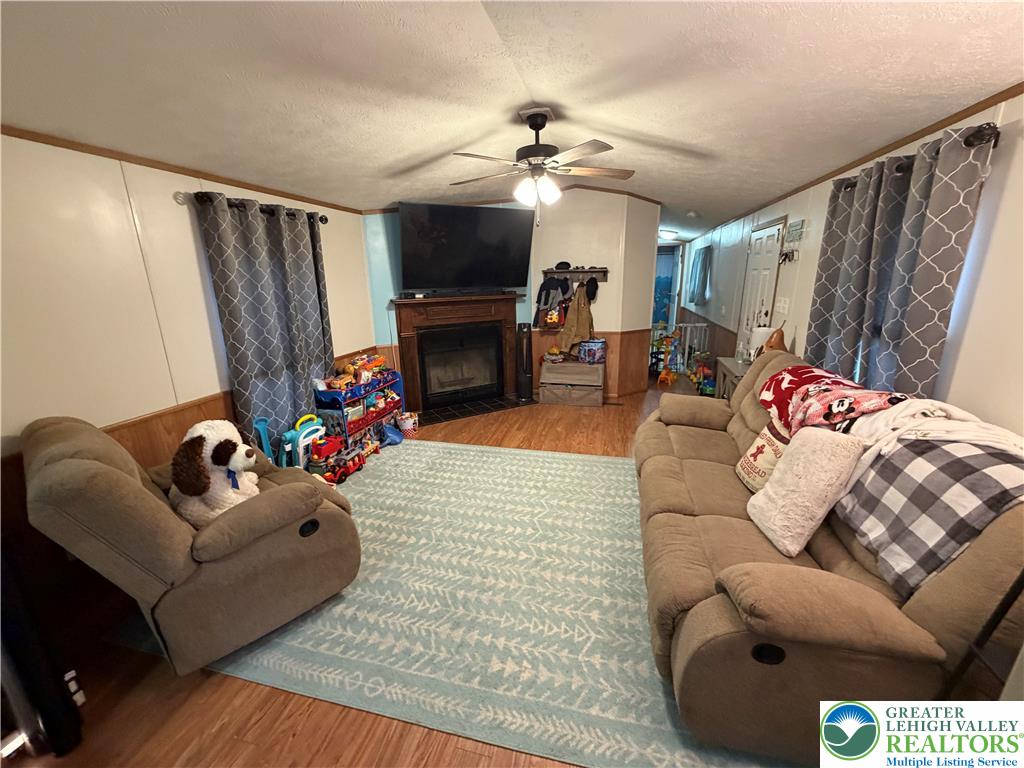 6318 Lamar Court Slatington, PA 18080 - Photo 3 of 18 a living room with furniture and a fireplace