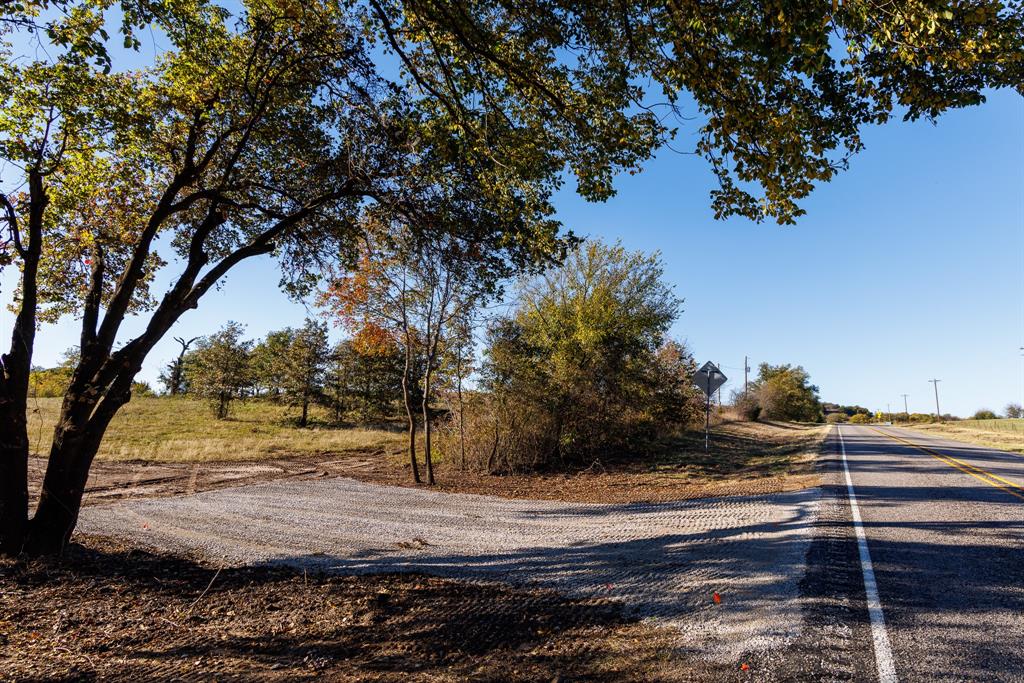 2 Fm 677 St. Jo, TX 76265 - Photo 25 of 27 a view of a yard with wooden fence