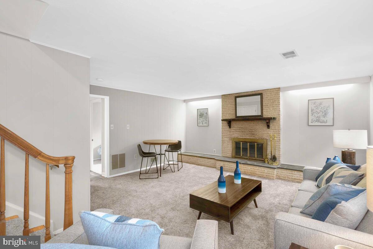 903 Leverton Road Rockville, MD 20852 - Photo 32 of 56 Familyroom with wood burning fireplace
