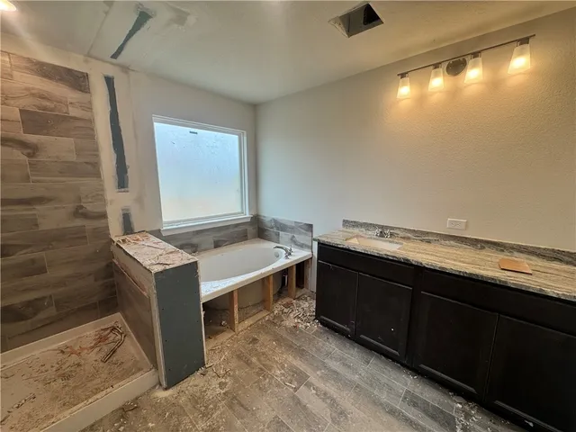 a kitchen with a stove and a sink