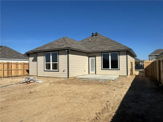 a house with trees in front of it