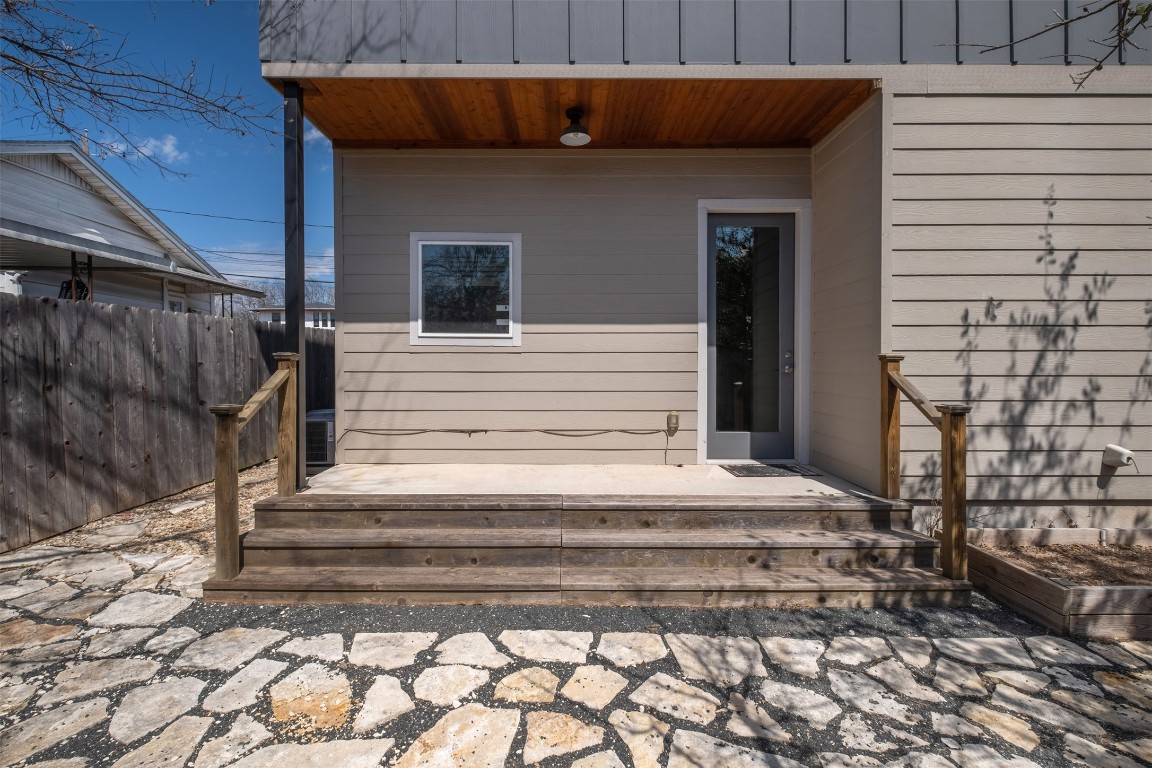4707 Leslie Avenue, Unit A Austin, TX 78721 - Photo 24 of 24 View of exterior entry featuring a deck