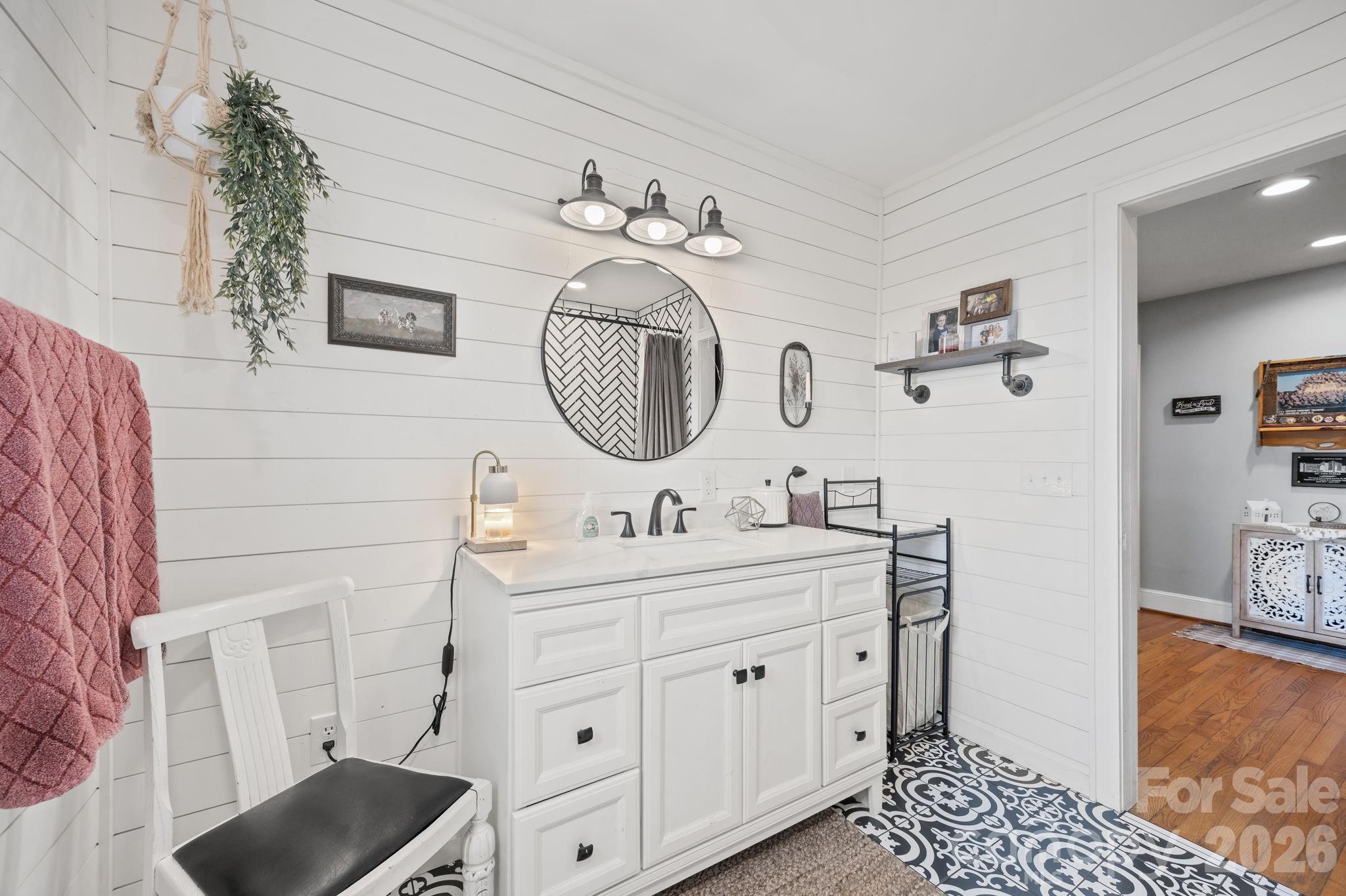 275 Tanner Street Rutherfordton, NC 28139 - Photo 39 of 44 a bathroom with a toilet sink and mirror
