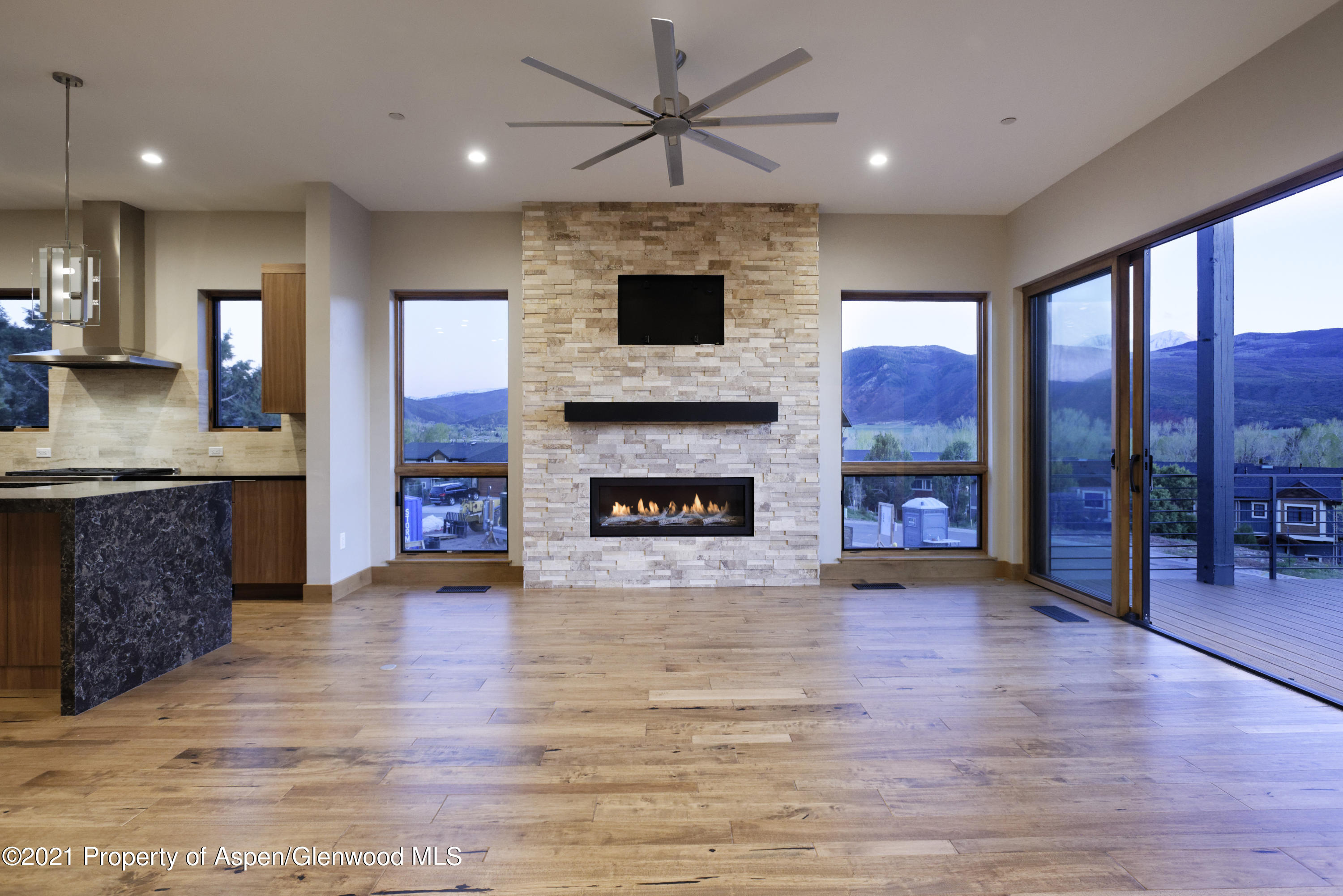 350 Overlook Ridge Basalt, CO 81621 - Photo 12 of 53 a large hall with kitchen view and a fireplace