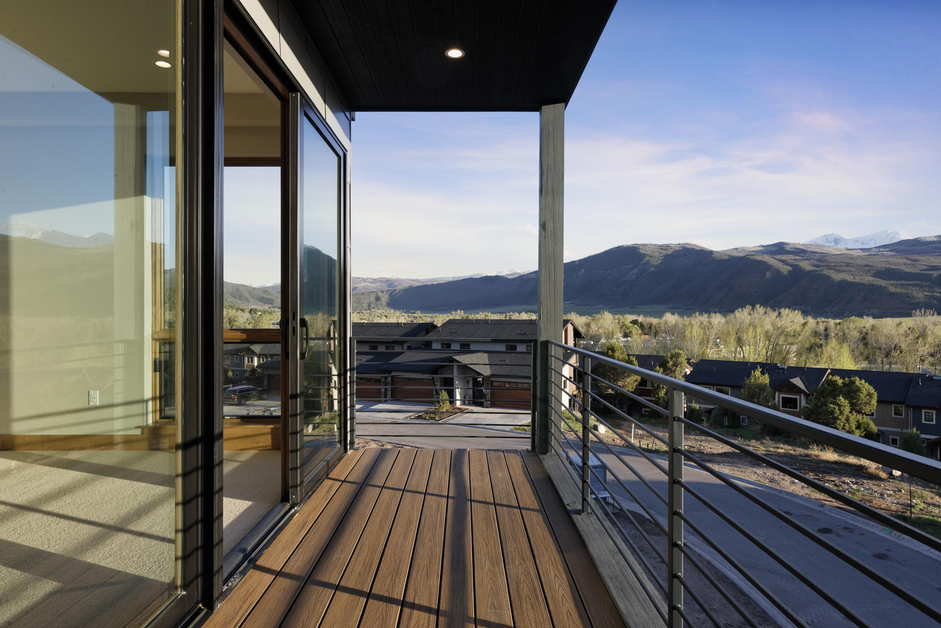 350 Overlook Ridge Basalt, CO 81621 - Photo 17 of 53 a view of a balcony with wooden floor and fence