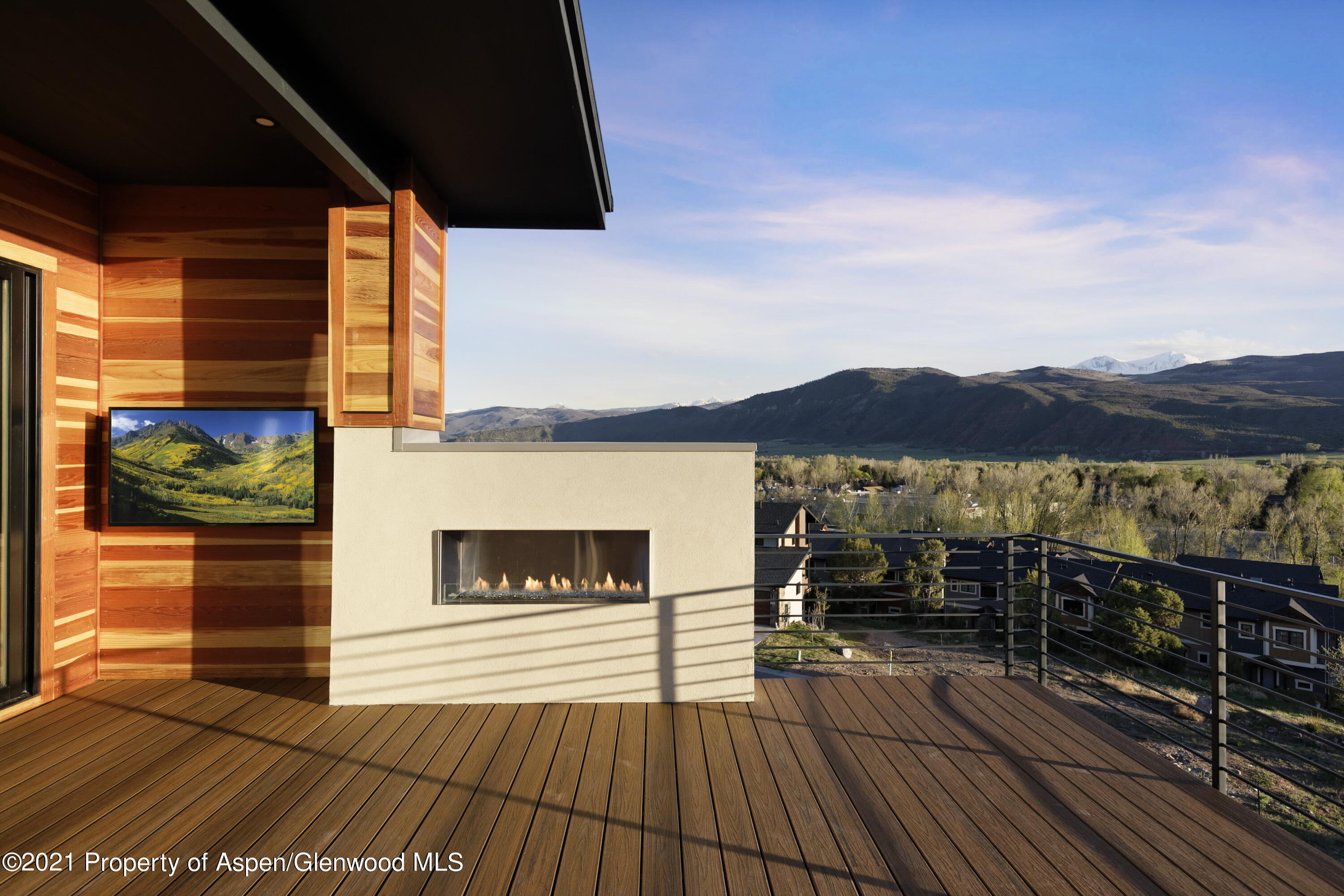 350 Overlook Ridge Basalt, CO 81621 - Photo 19 of 53 a view of a terrace with wooden floor and a potted plant