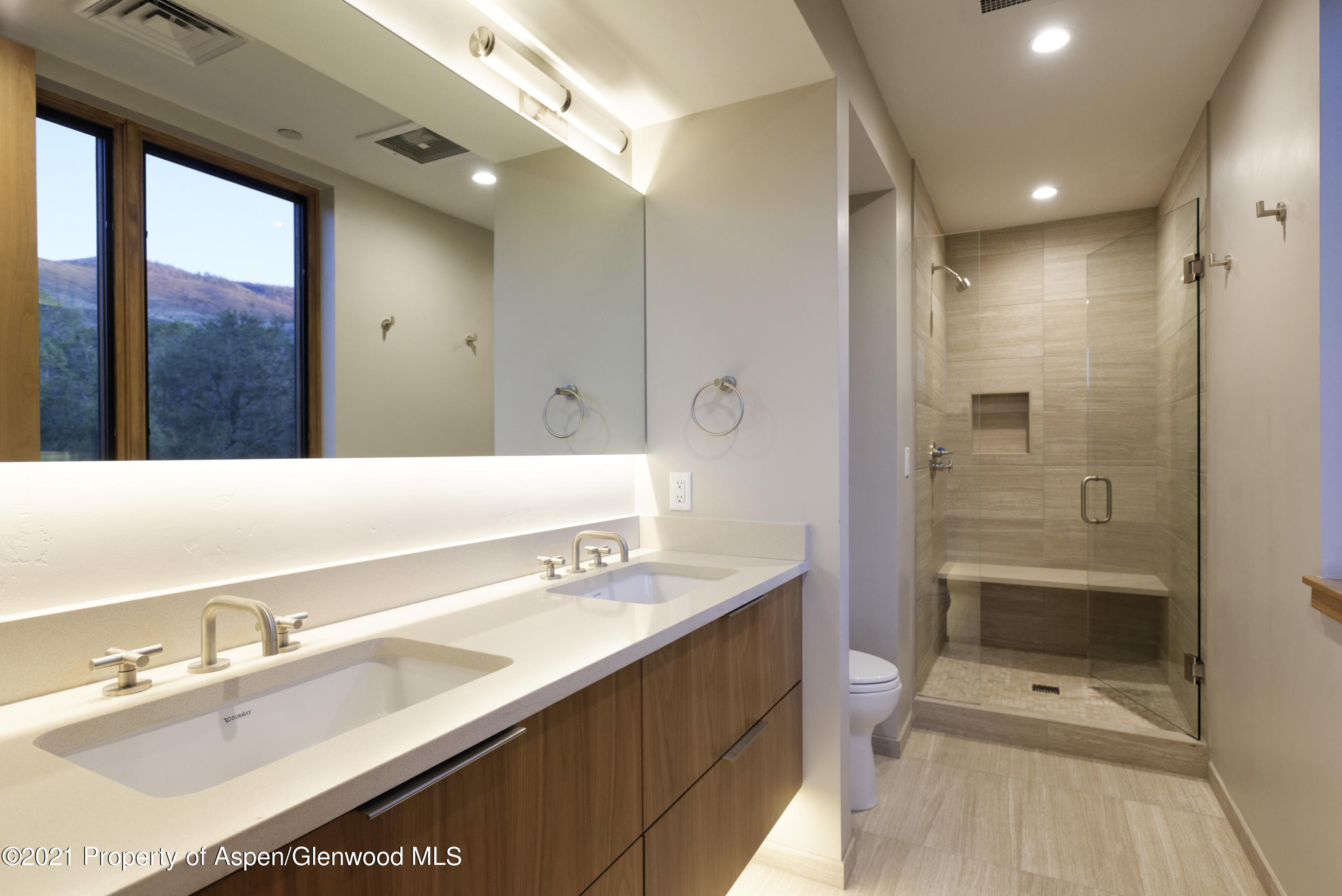 350 Overlook Ridge Basalt, CO 81621 - Photo 32 of 53 a bathroom with a sink double vanity and a shower