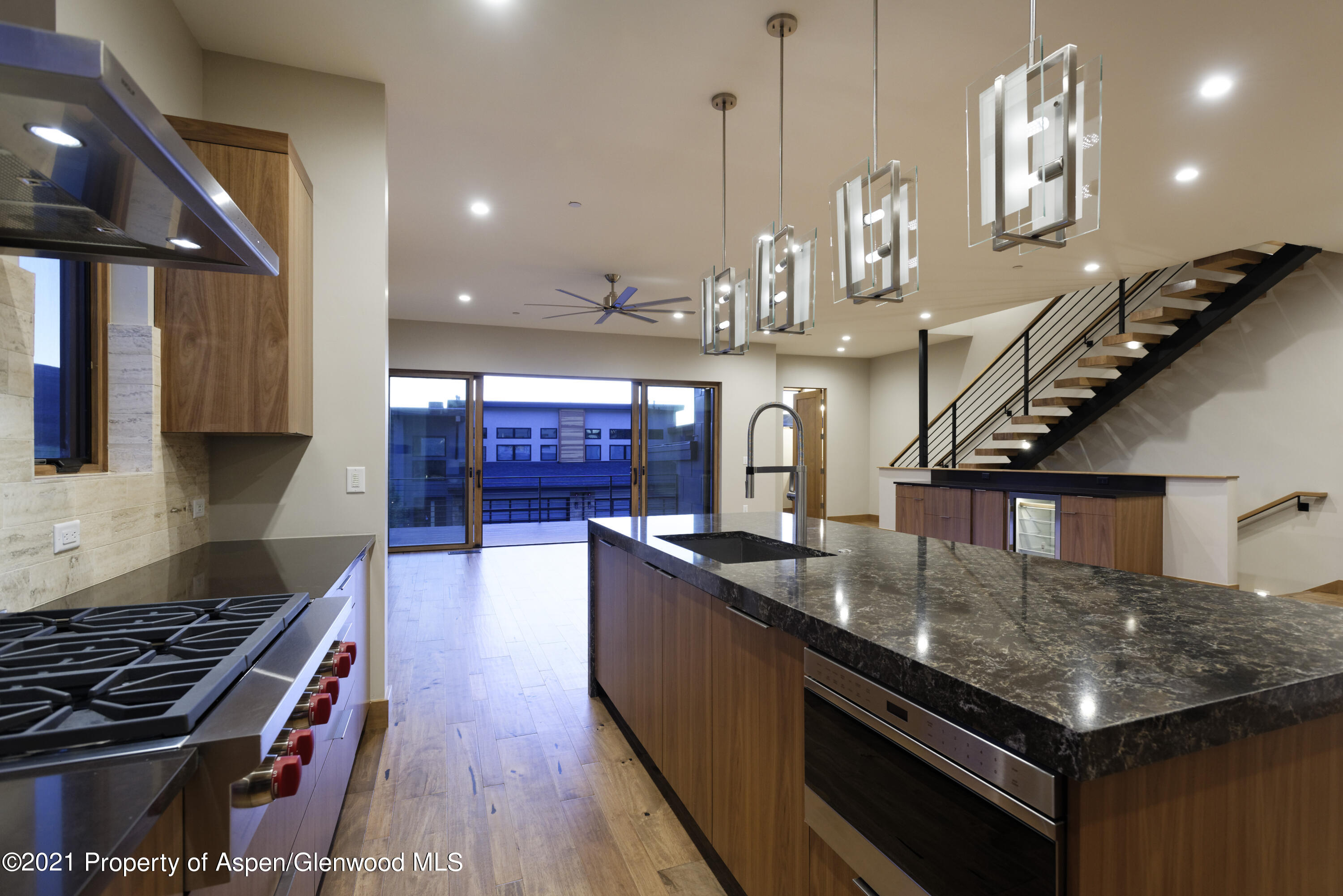 350 Overlook Ridge Basalt, CO 81621 - Photo 4 of 53 a kitchen with stainless steel appliances granite countertop a stove and a sink