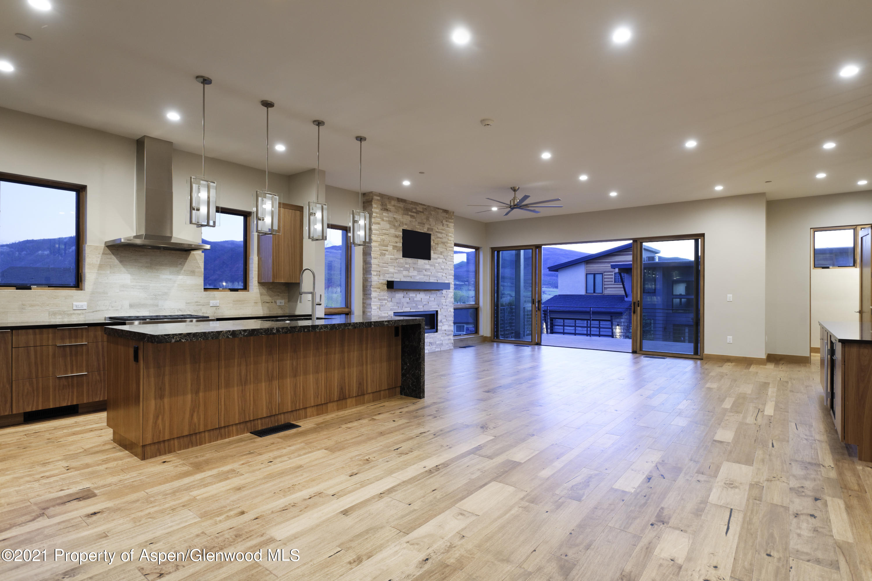 350 Overlook Ridge Basalt, CO 81621 - Photo 7 of 53 a large kitchen with stainless steel appliances granite countertop a large counter top a sink and a island