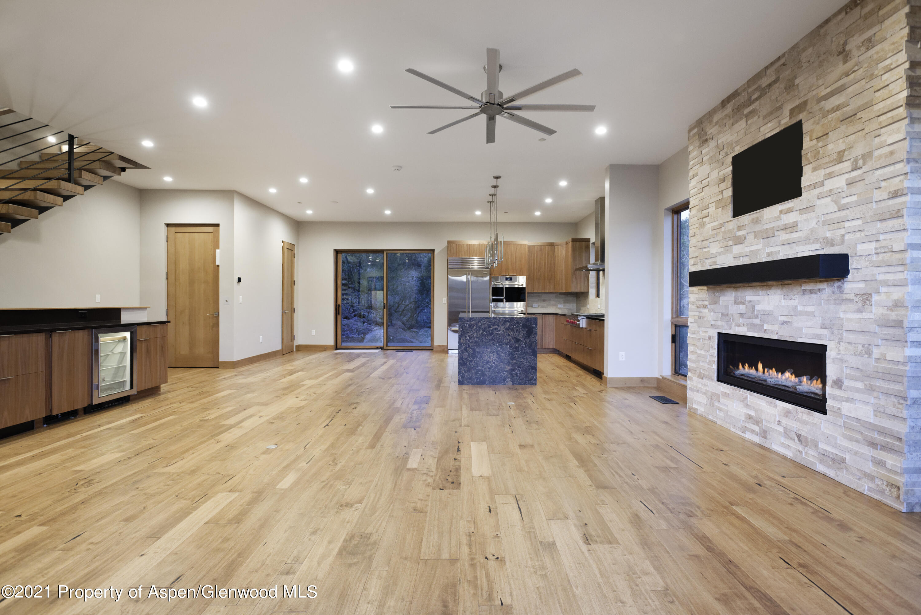 350 Overlook Ridge Basalt, CO 81621 - Photo 9 of 53 a view of kitchen and fireplace with wooden floor