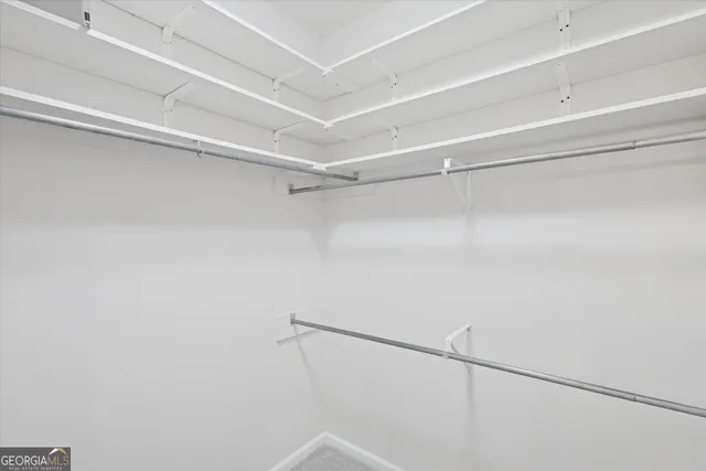 a view of a room with racks on the wall