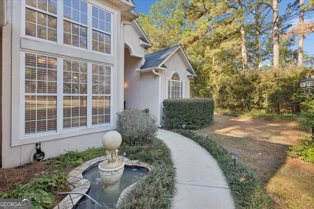 a house view with a outdoor space