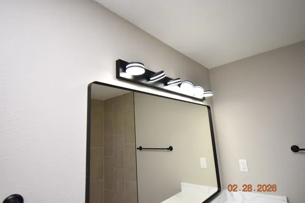 a bathroom with a sink and toilet