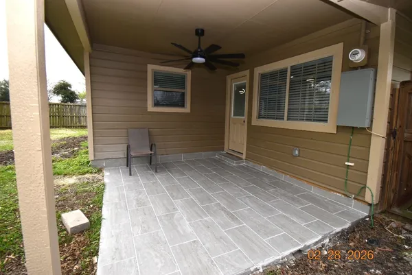 a view of backyard with trampoline