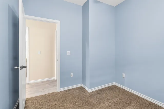 an empty room with closet