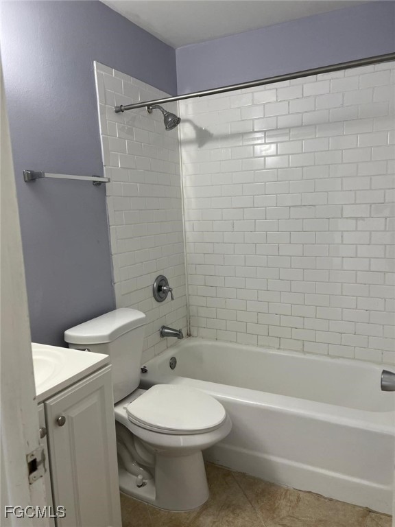 3325 Airport Road North, Unit S7 Naples, FL 34105 - Photo 6 of 7 a bathroom with a sink a toilet and a bathtub