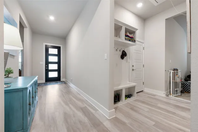a view of entryway with wooden floor