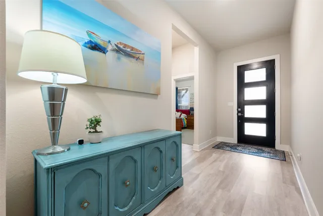 a room with a bed and a window