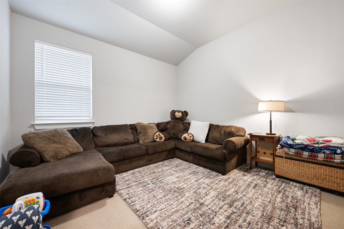 2212 Prairie Oaks Drive Georgetown, TX 78628 - Photo 31 of 39 a living room with furniture and a window
