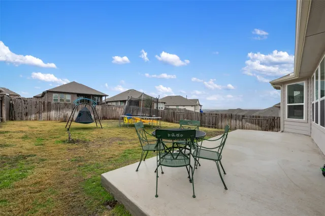 a swimming pool with a yard