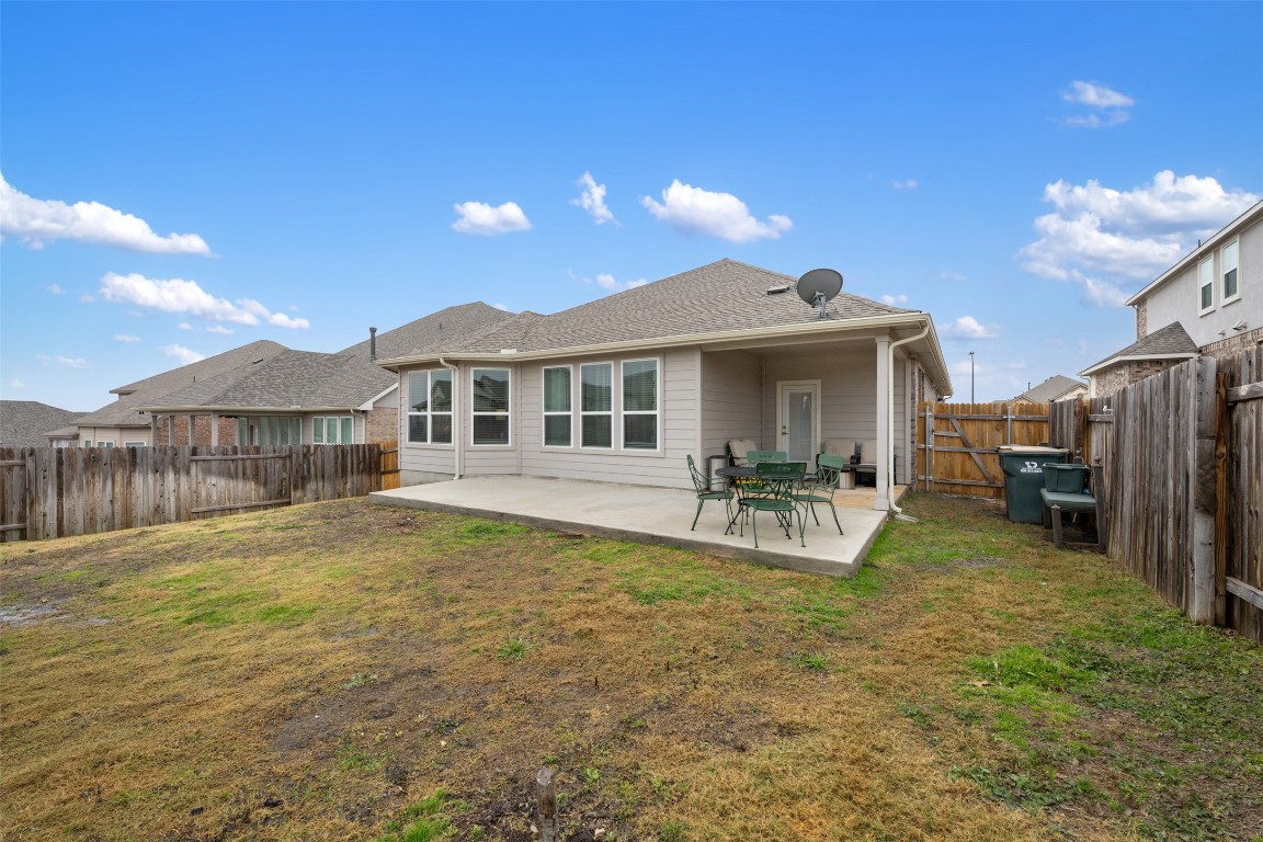 2212 Prairie Oaks Drive Georgetown, TX 78628 - Photo 39 of 39 a view of a house with backyard porch and sitting area