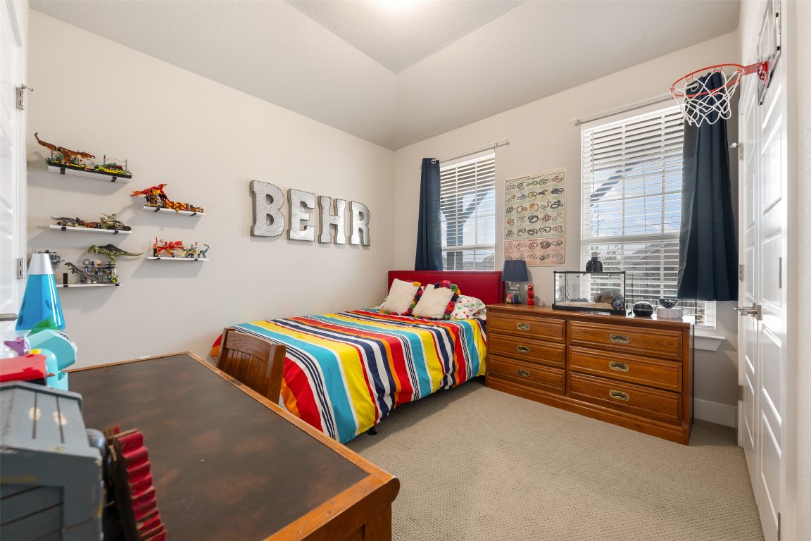 2212 Prairie Oaks Drive Georgetown, TX 78628 - Photo 4 of 39 a room with a bed and a window