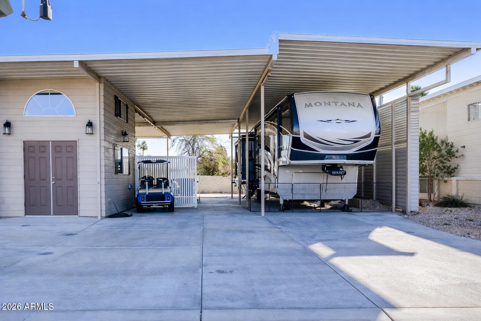17200 West Bell Road, Unit 1052 Surprise, AZ 85374 - Photo 14 of 17 a view of a livingroom with furniture and a fireplace