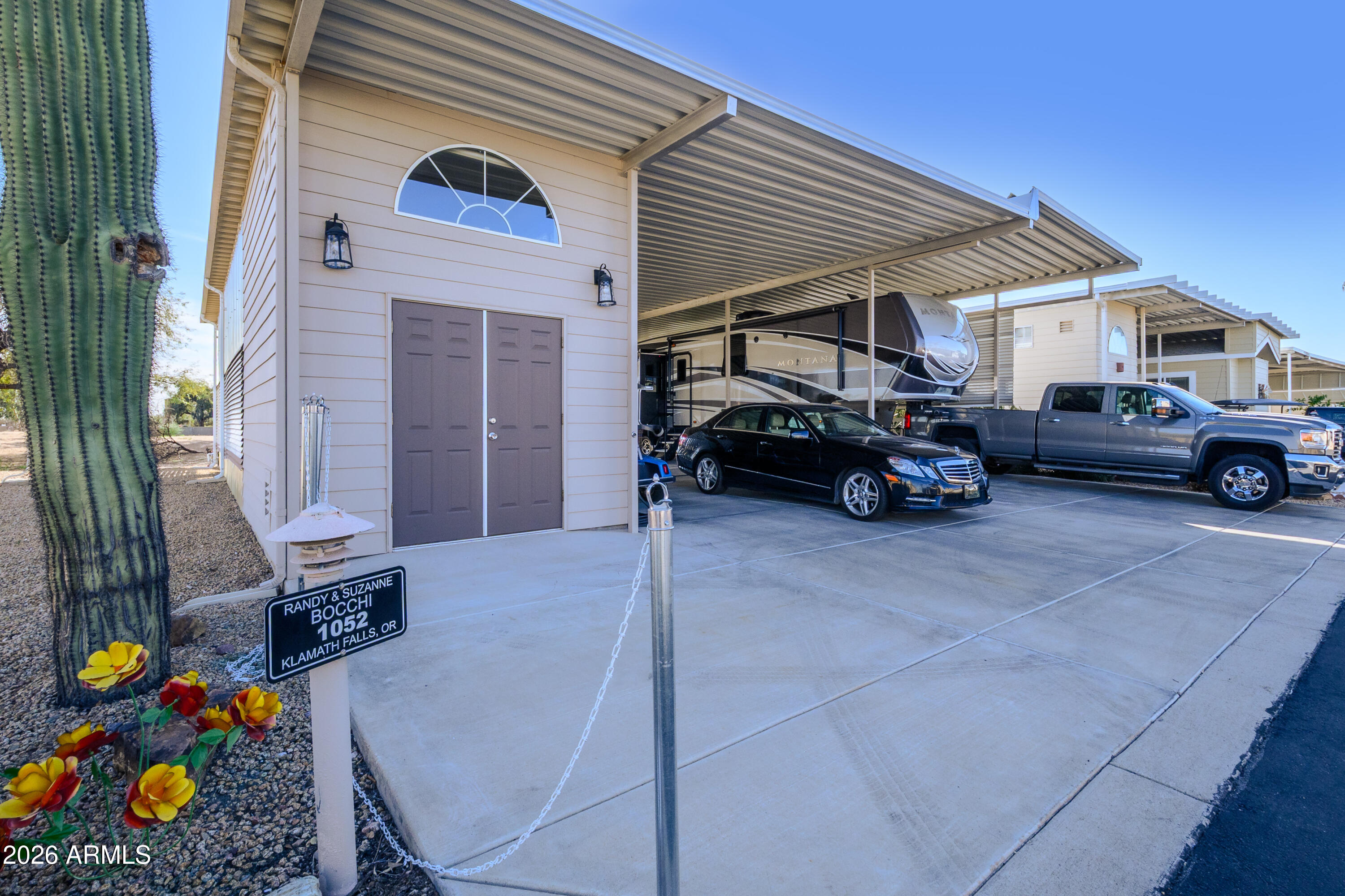 17200 West Bell Road, Unit 1052 Surprise, AZ 85374 - Photo 2 of 17 a car parked in front of a house