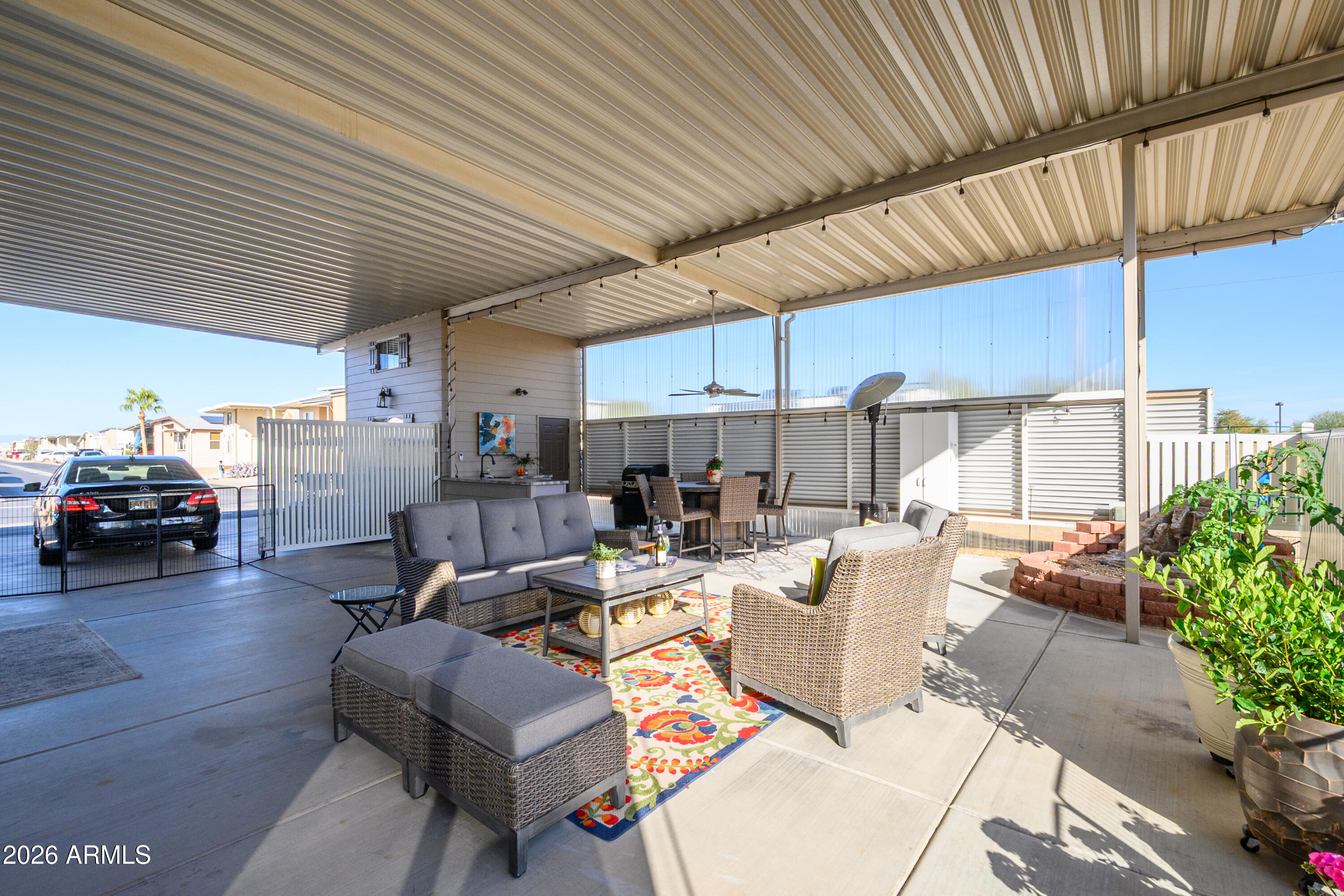 17200 West Bell Road, Unit 1052 Surprise, AZ 85374 - Photo 5 of 17 a living room with furniture and a table