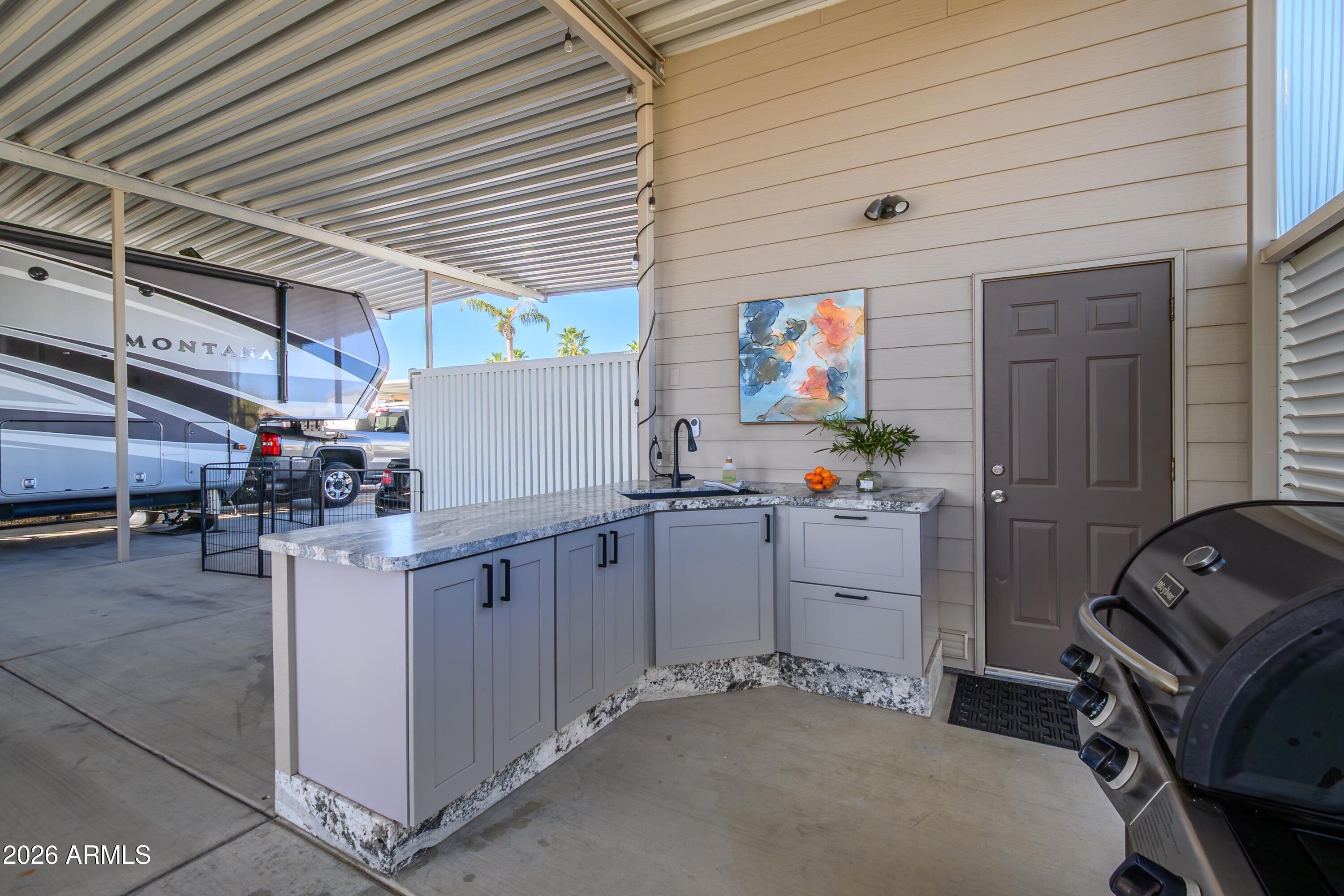 17200 West Bell Road, Unit 1052 Surprise, AZ 85374 - Photo 7 of 17 a room with storage and utility