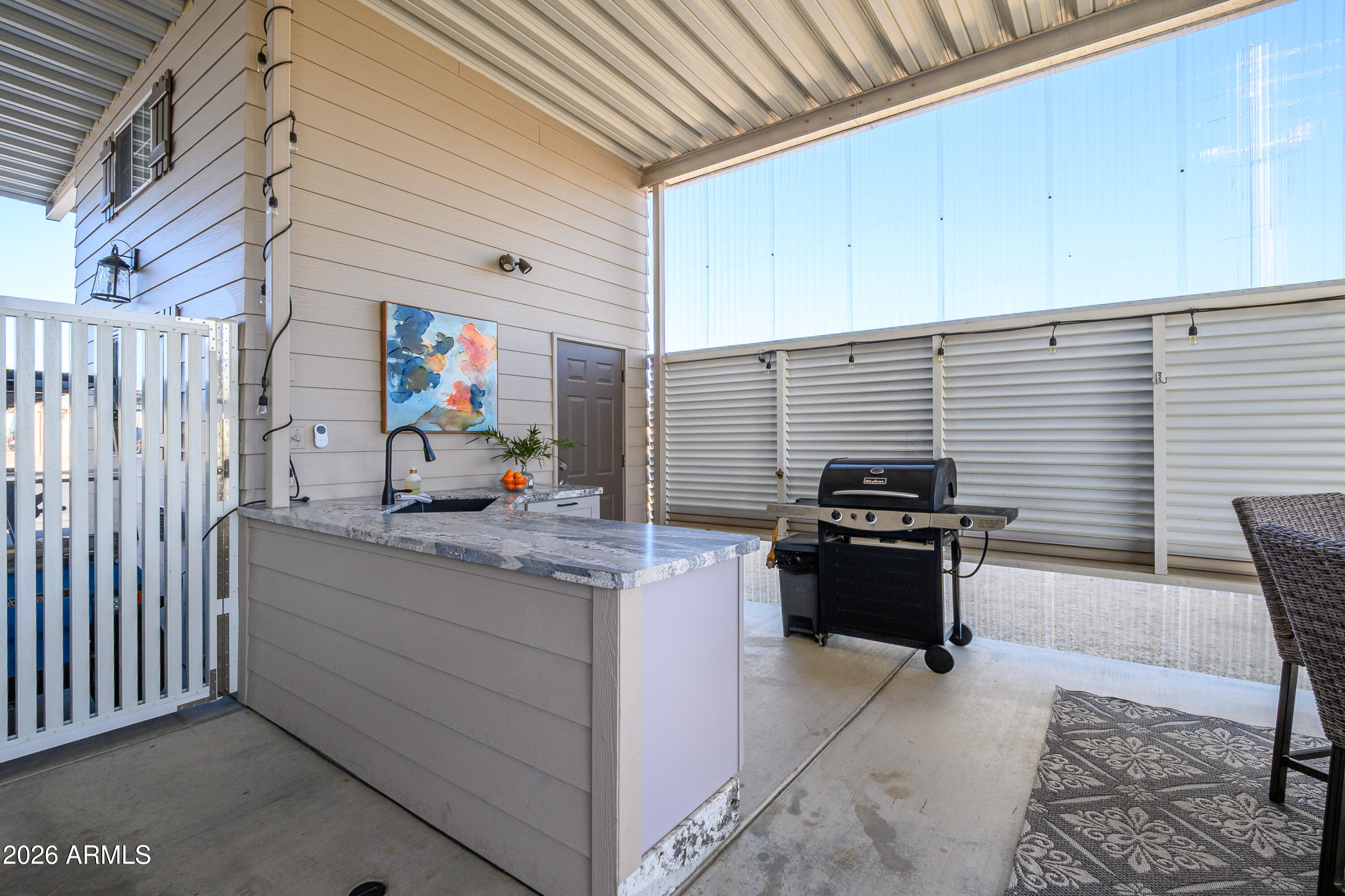 17200 West Bell Road, Unit 1052 Surprise, AZ 85374 - Photo 8 of 17 a work place with table and chairs