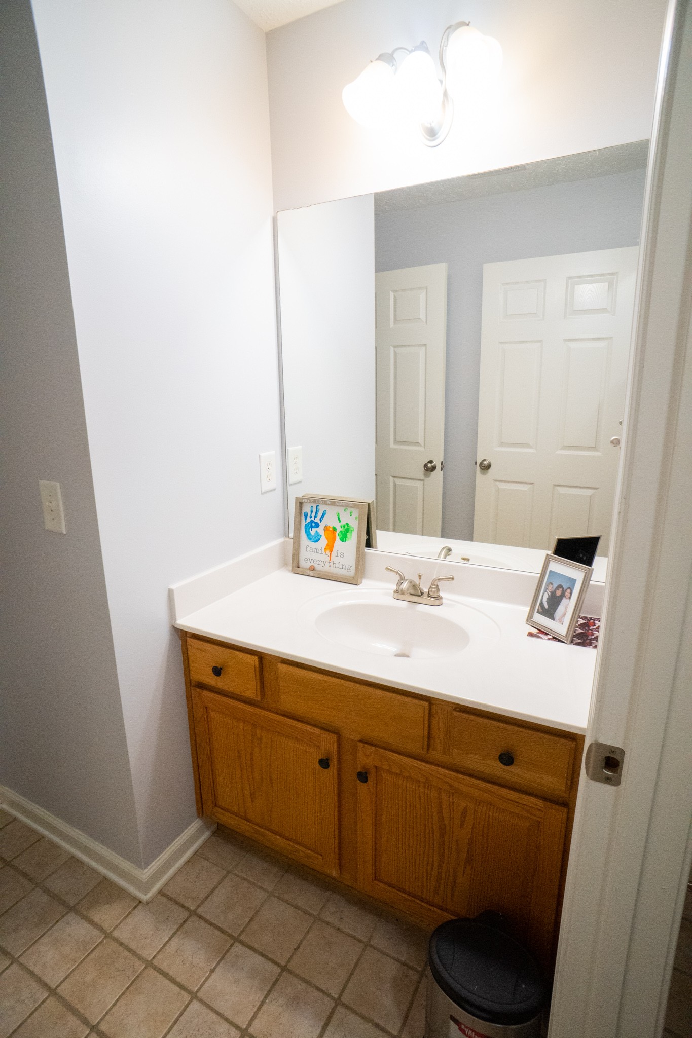 4205 Turnberry Road Lebanon, TN 37090 - Photo 22 of 37 a bathroom with a sink a toilet and a mirror