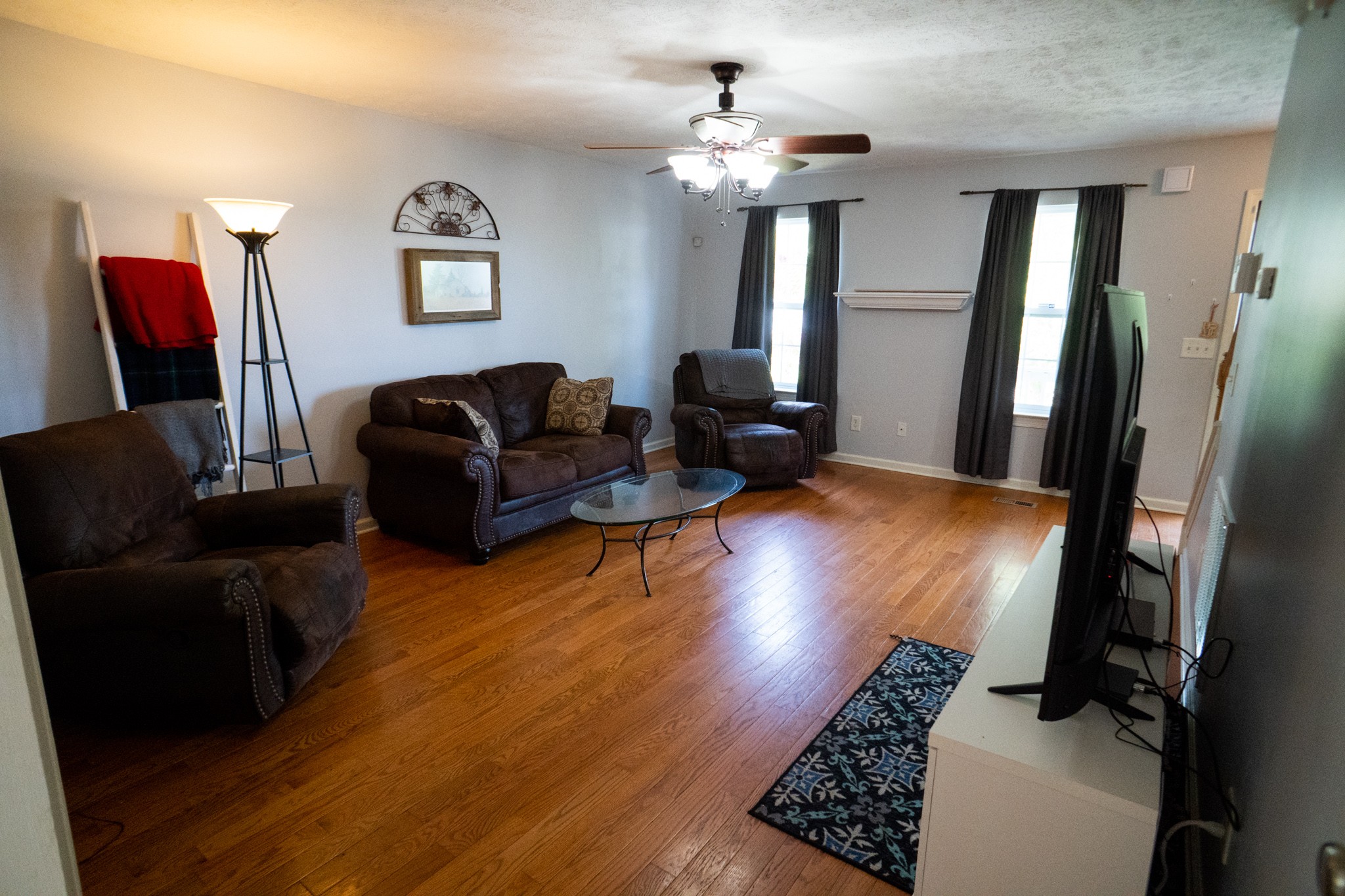 4205 Turnberry Road Lebanon, TN 37090 - Photo 4 of 37 a living room with furniture and a chandelier