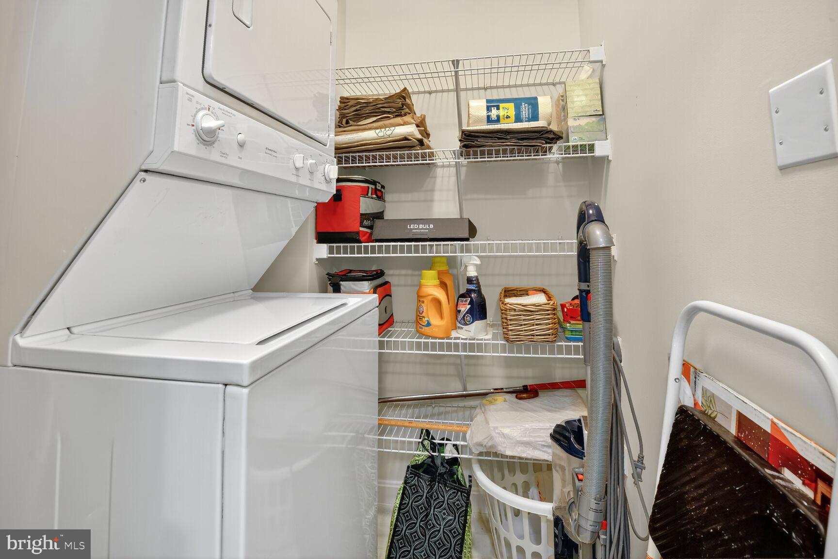 19355 Cypress Ridge Terrace, Unit 503 Leesburg, VA 20176 - Photo 14 of 22 a utility room with dryer and washer