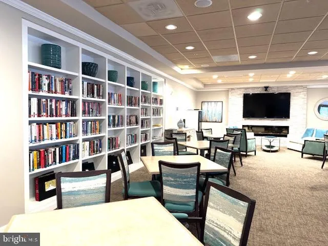 a kitchen with stainless steel appliances a refrigerator a stove a microwave and cabinets