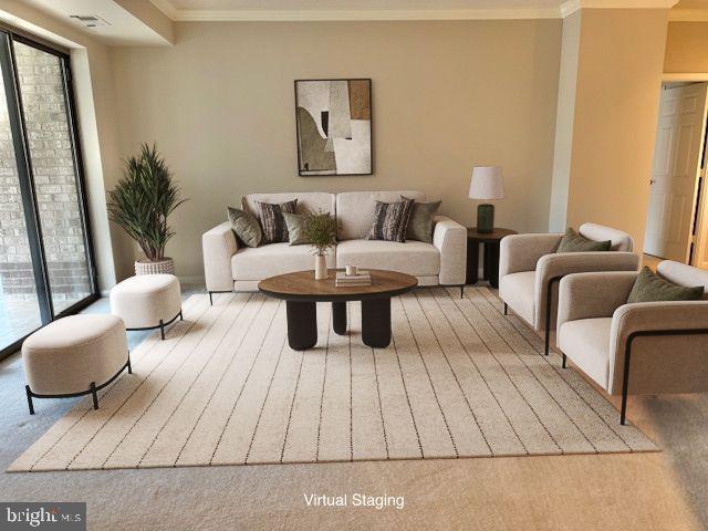 19355 Cypress Ridge Terrace, Unit 503 Leesburg, VA 20176 - Photo 3 of 22 a living room with furniture and a couch