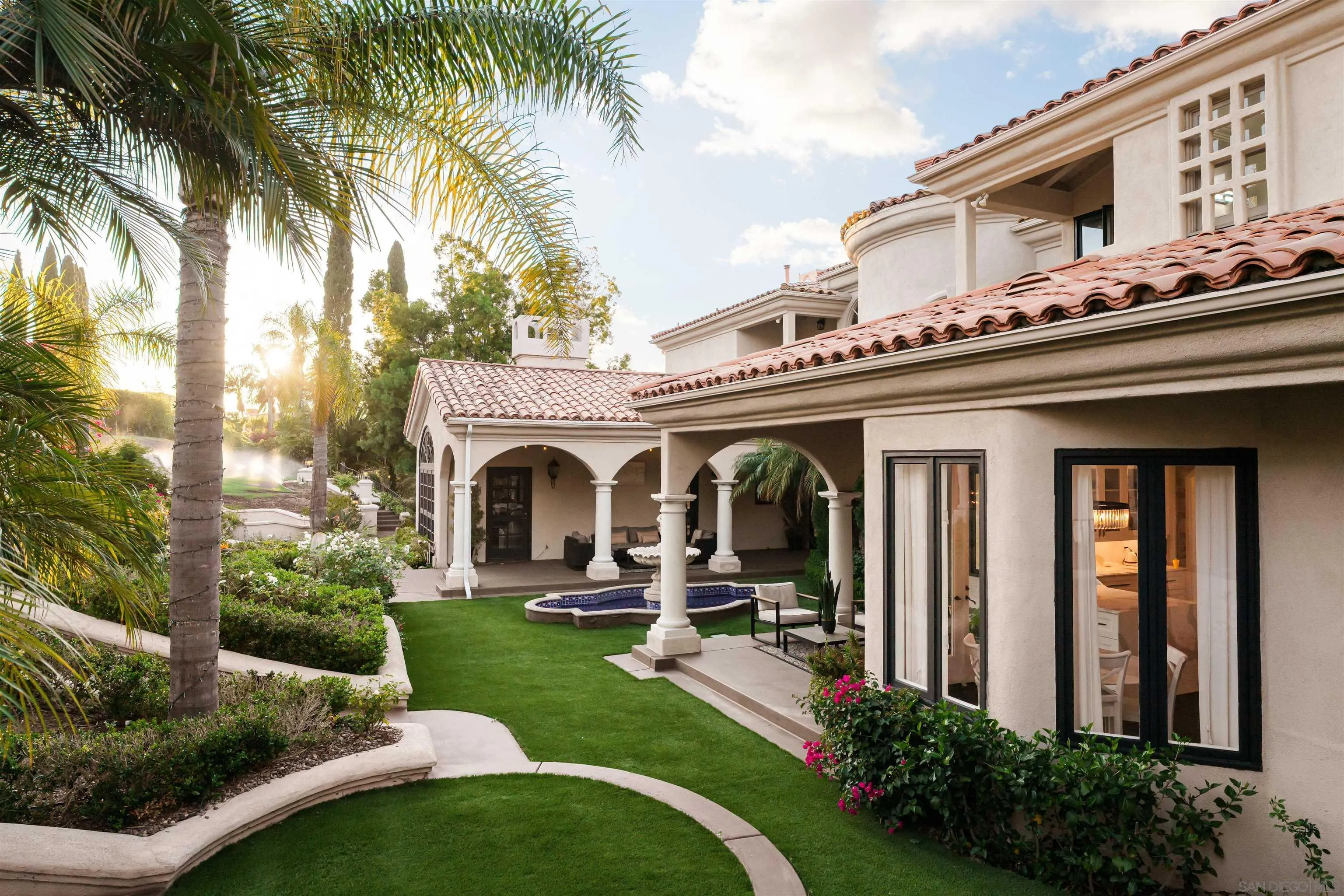 18136 Via Ascenso Rancho Santa Fe, CA 92067 - Photo 27 of 41 a view of a house with patio yard and swimming pool