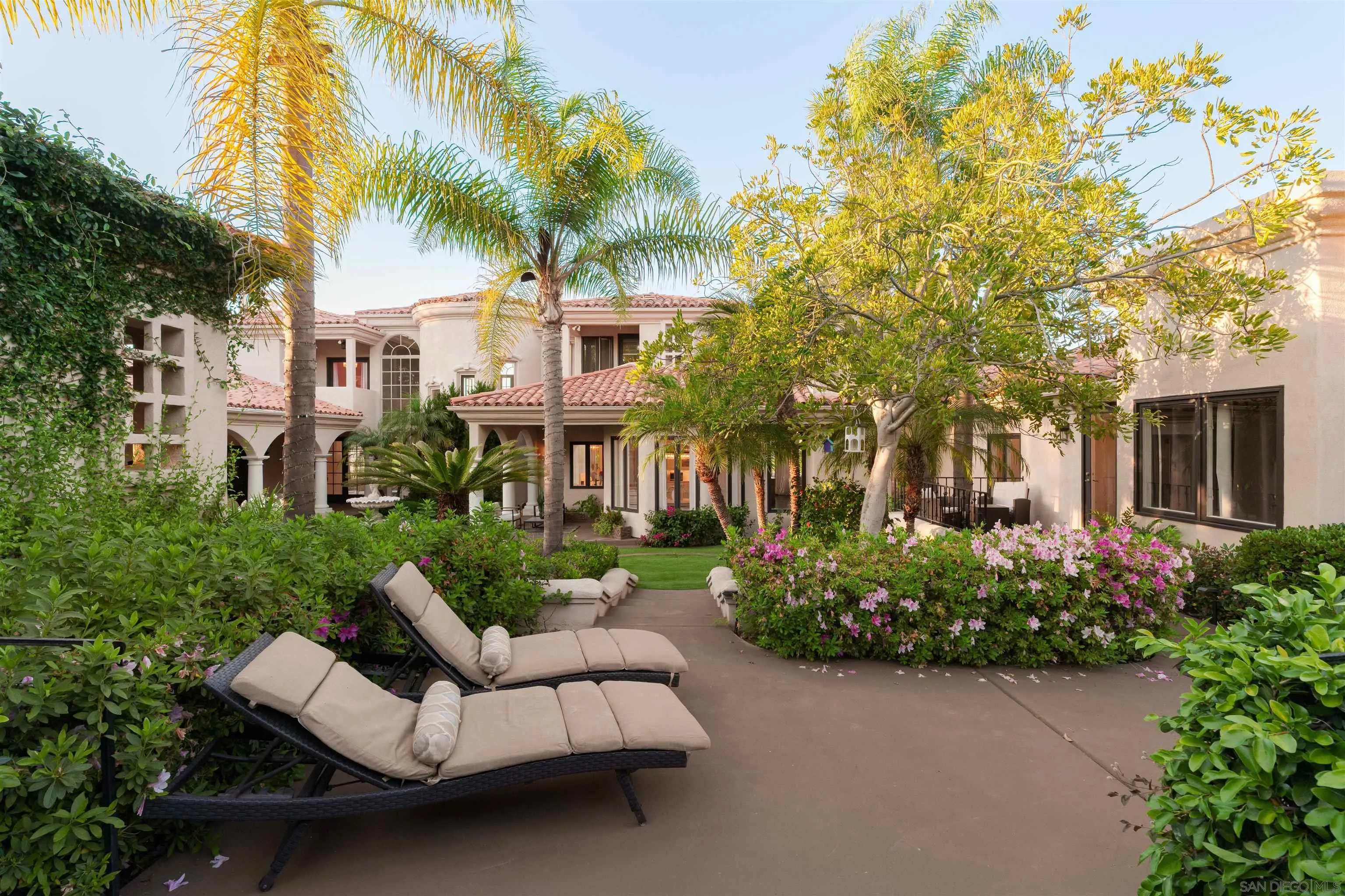 18136 Via Ascenso Rancho Santa Fe, CA 92067 - Photo 28 of 41 front view of a house with a garden