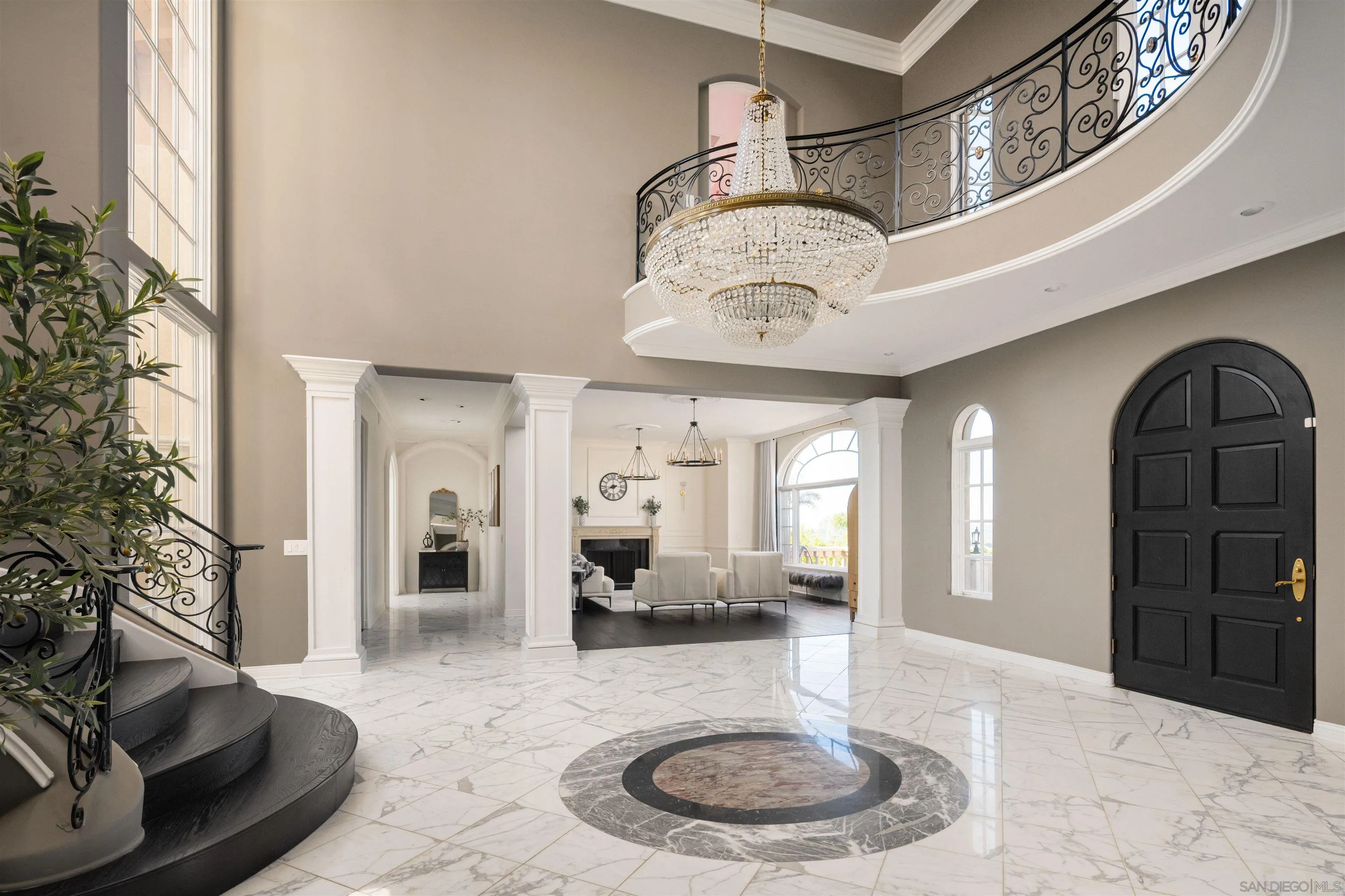 18136 Via Ascenso Rancho Santa Fe, CA 92067 - Photo 3 of 41 a lobby with furniture and a chandelier