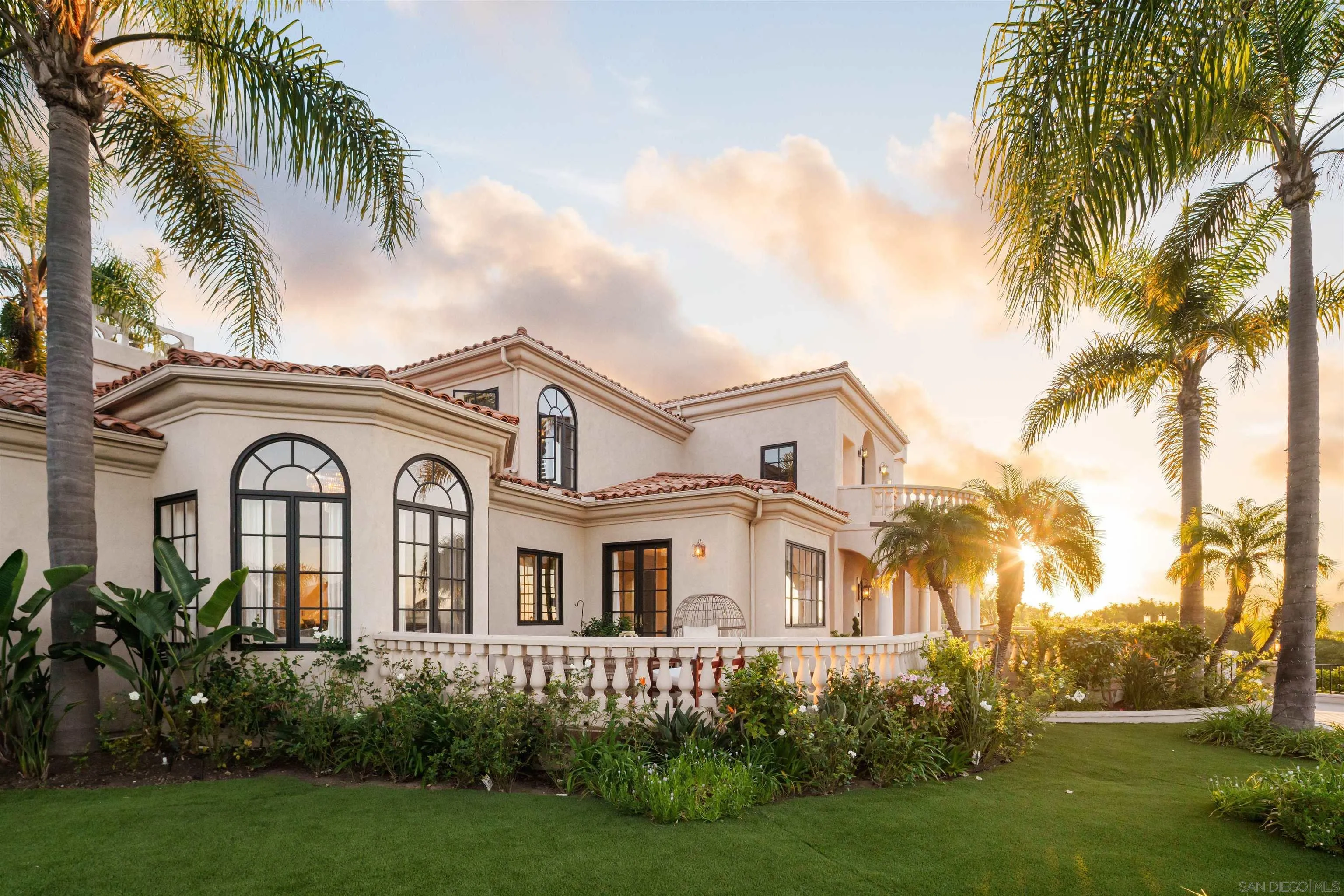 18136 Via Ascenso Rancho Santa Fe, CA 92067 - Photo 32 of 41 a front view of a house with a garden