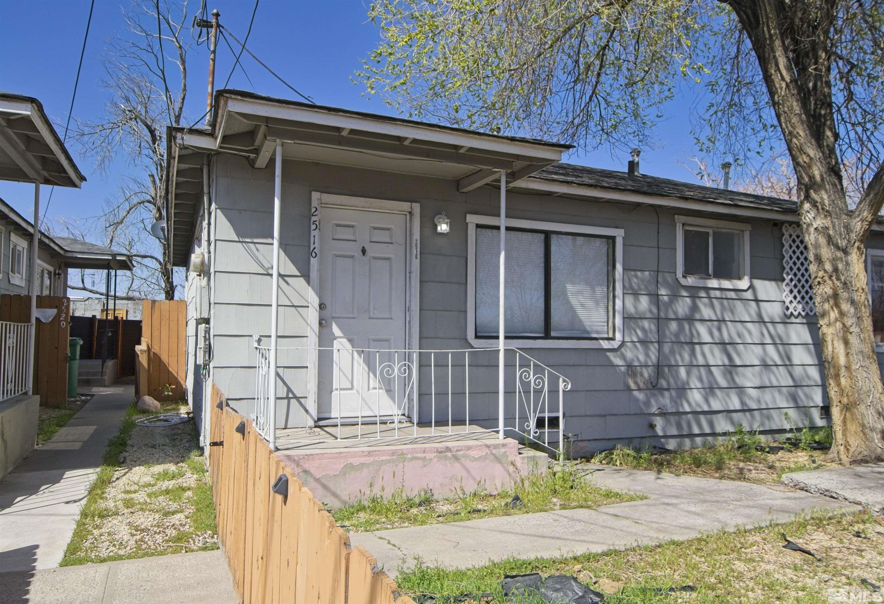 2516 D Street Sparks, NV 89431 - Photo 2 of 9 a front view of a house with garden