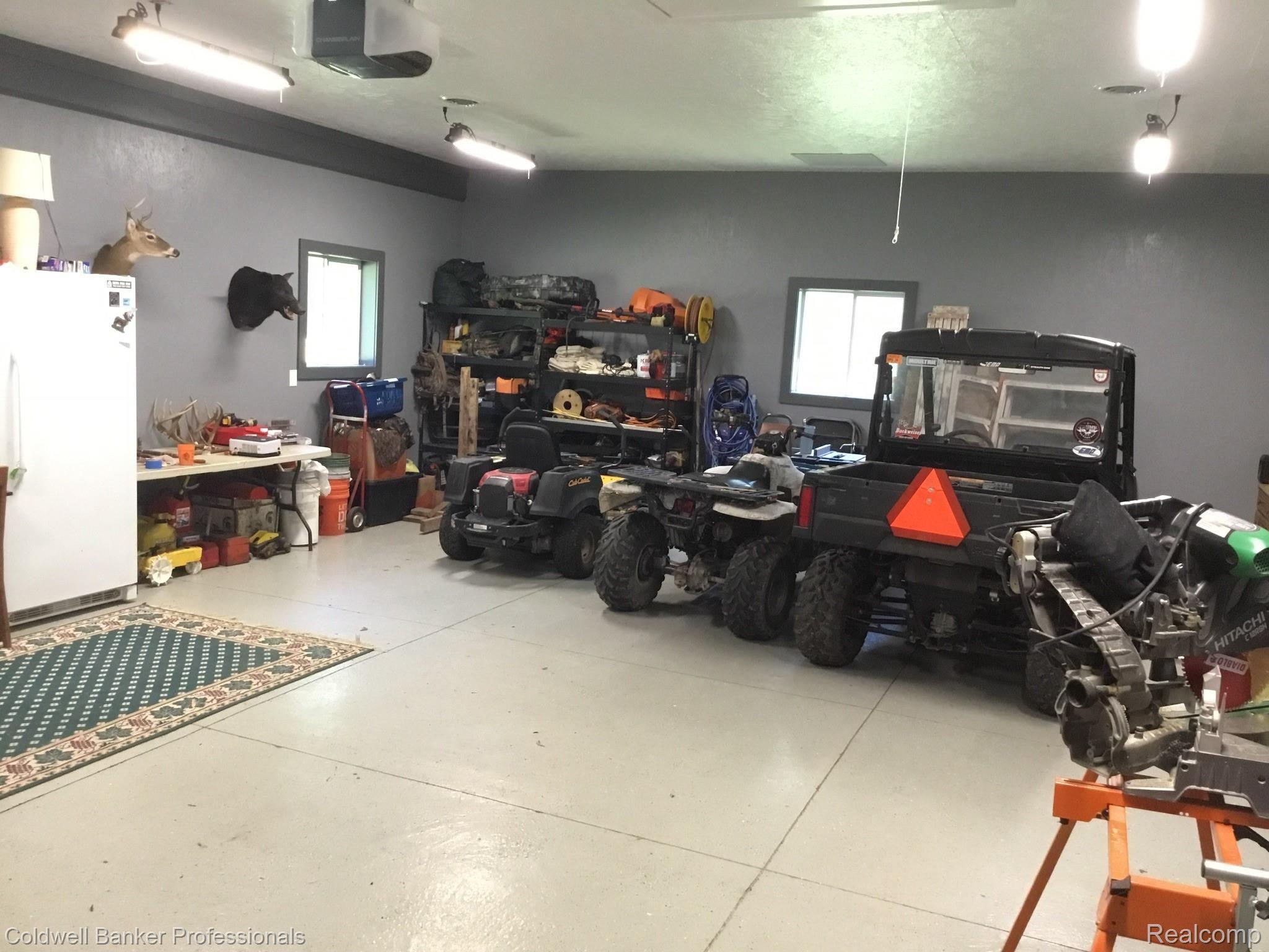 401 Munger Road Holly, MI 48442 - Photo 24 of 29 Pole Barn has tons of room for ATV's and cars alike