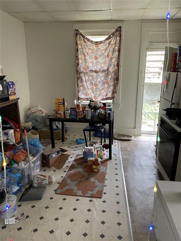 620 Kirkpatrick Street Pittsburgh, PA 15219 - Photo 7 of 8 a living room with furniture a window and a flat screen tv