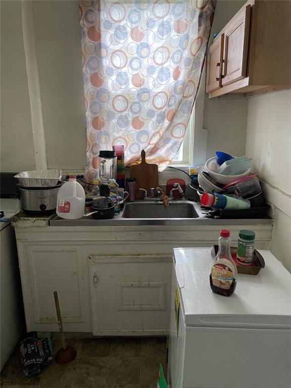 620 Kirkpatrick Street Pittsburgh, PA 15219 - Photo 8 of 8 a bathroom with a sink and cabinets